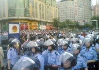 Chinese police assemble opposite protestors, Urumqi, Xinjiang region, 5 July 2009